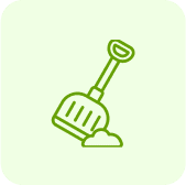 Green shovel on light background